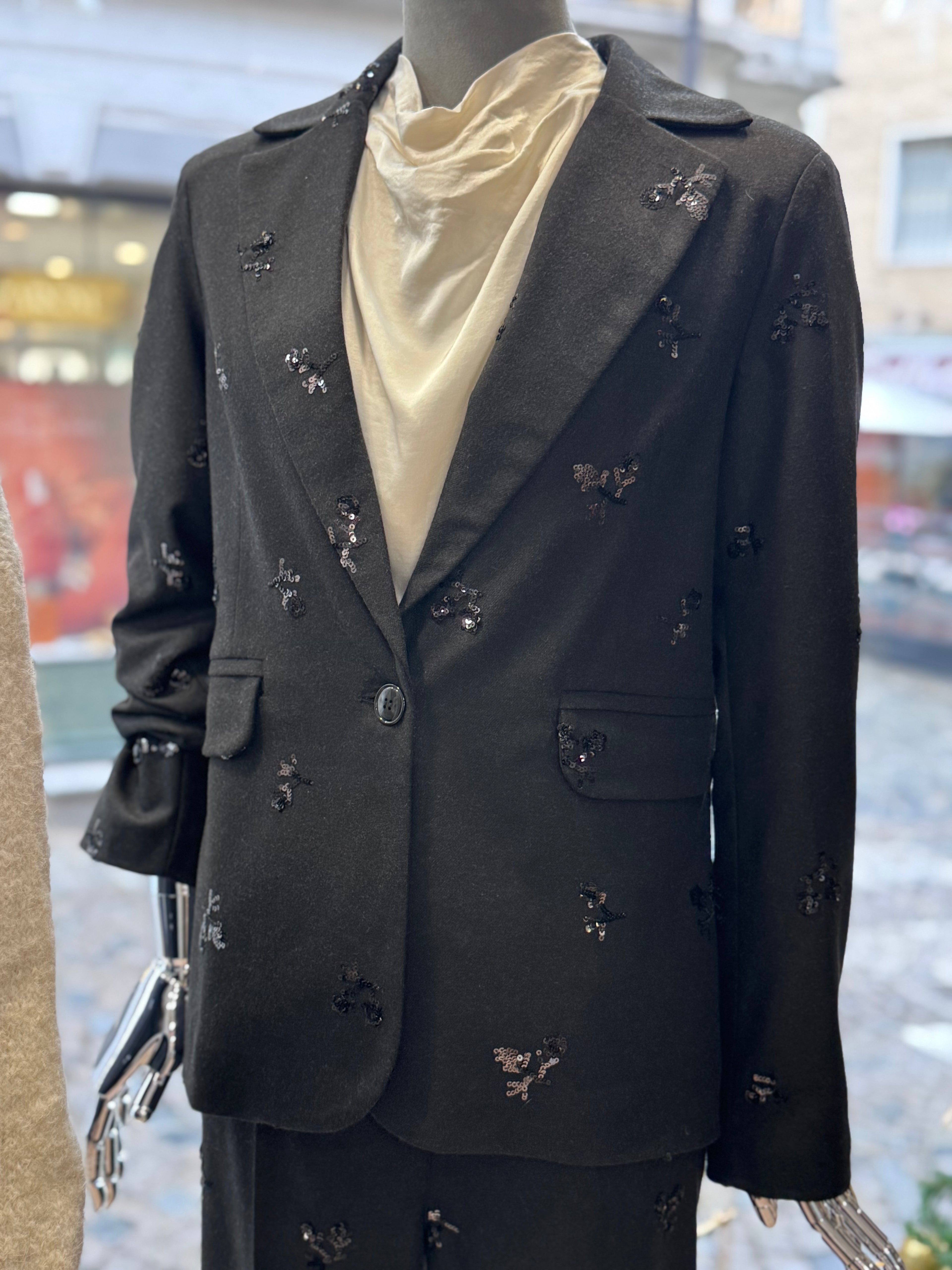 Giacca con paillettes